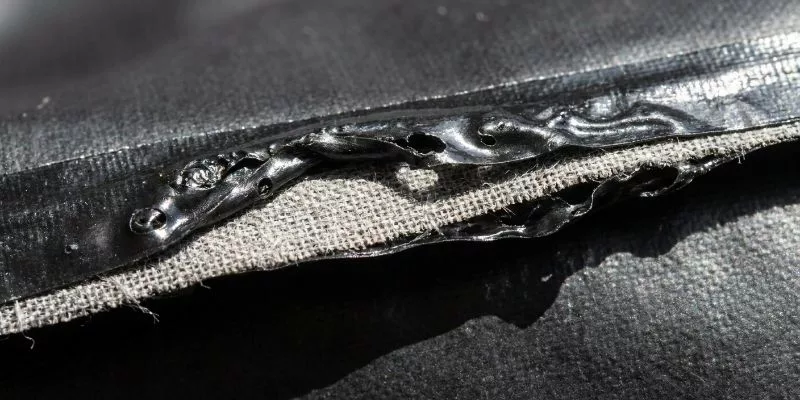 Delaminated and melted PU coated fabric seam after failed high-frequency welding