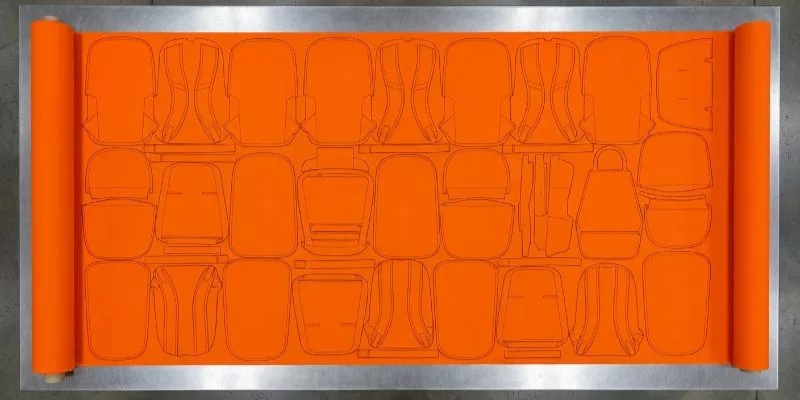 4. Top-down view of highly optimized fabric nesting layout showing 95 percent material utilization.