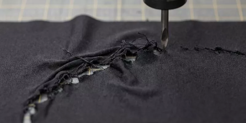 5. Macro view of a CNC cutting failure on extremely thin and stretchy fabric.